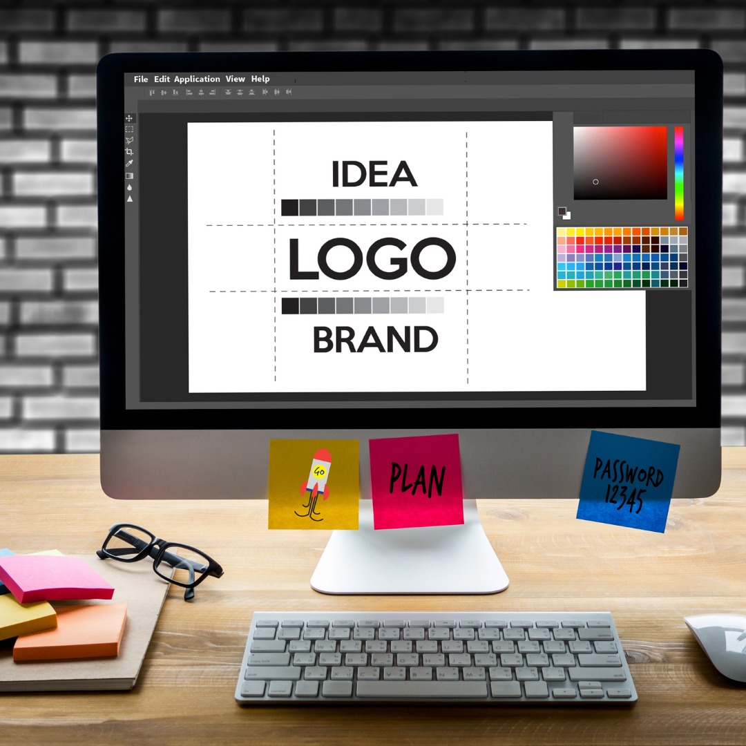 A business meeting with two people discussing logo design