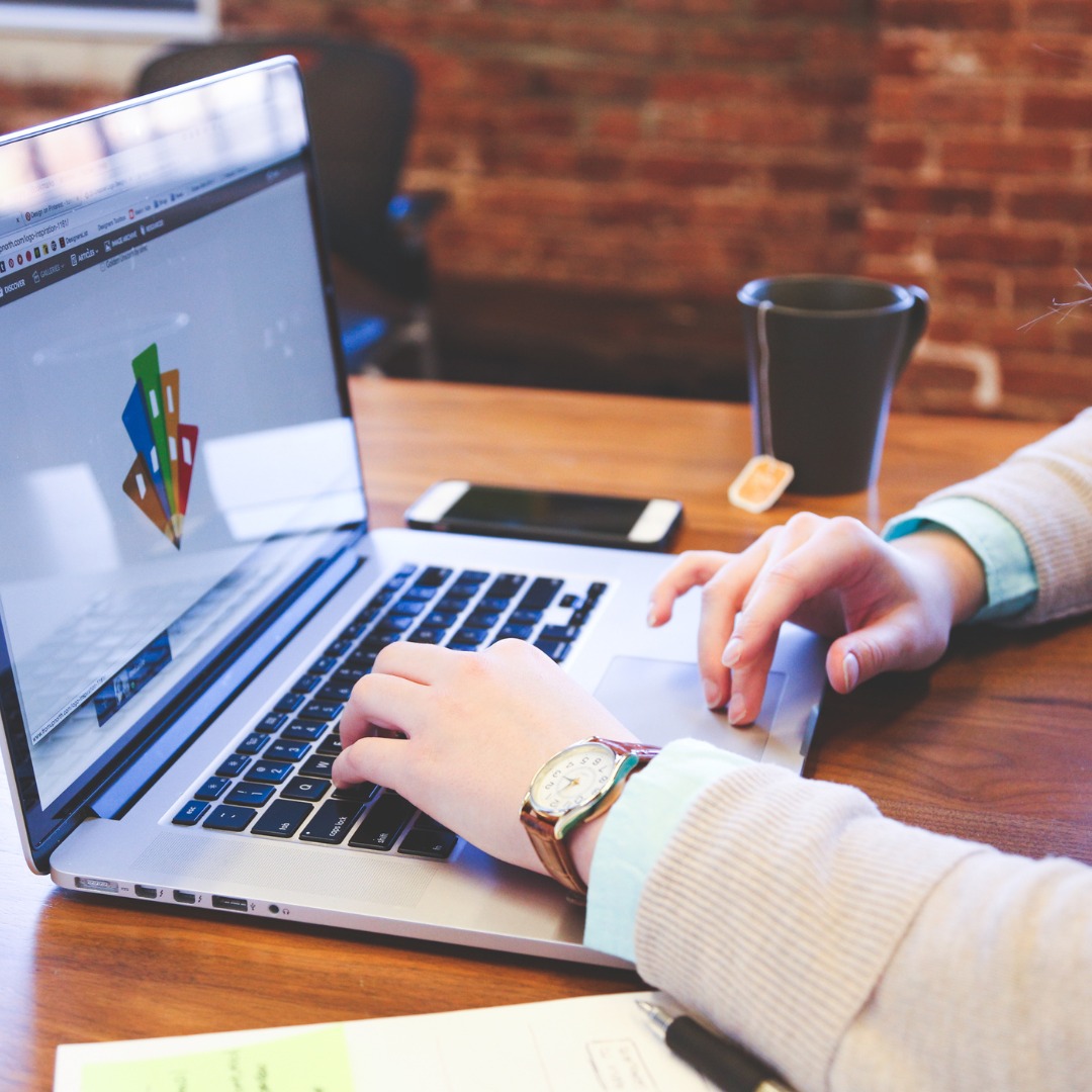 A professional designer working on a logo
