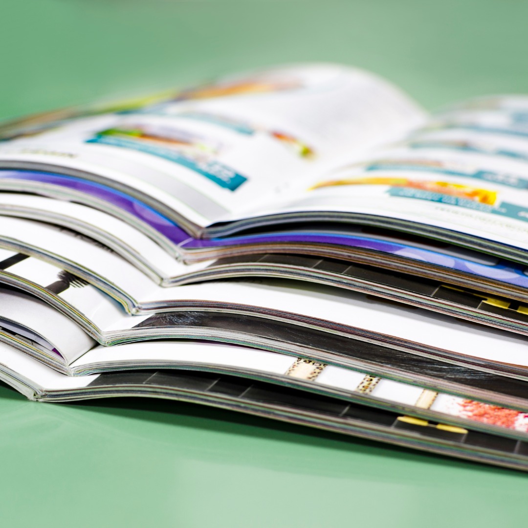 Professional brochure design layout shown on a digital screen.